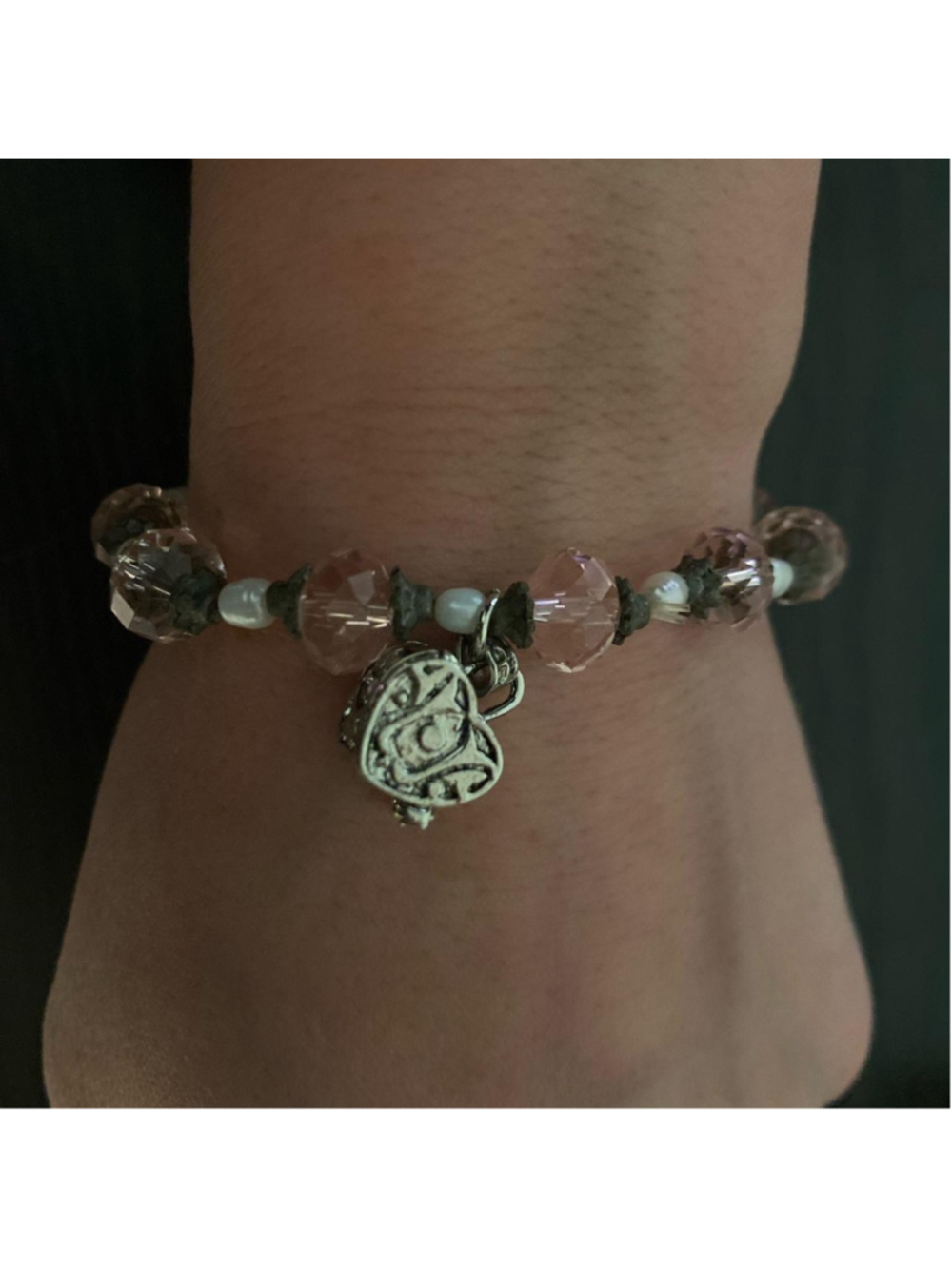 Pink stretchy beaded bracelet with heart locket charm that opens 💍